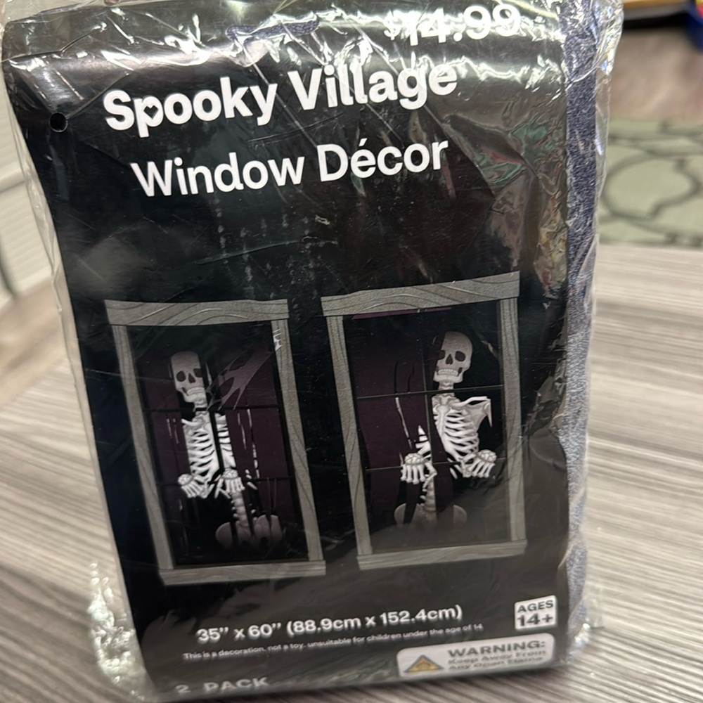 Spooky Village Window Decor 35” x 60” 2 pack skeletons in the window fabric